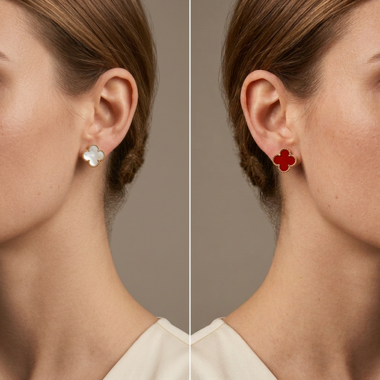 White mother-of-pearl and red carnelian clover stud earrings worn by a model.